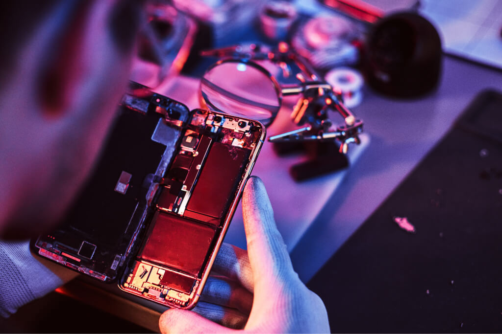 Technician Repairing Cell Phone